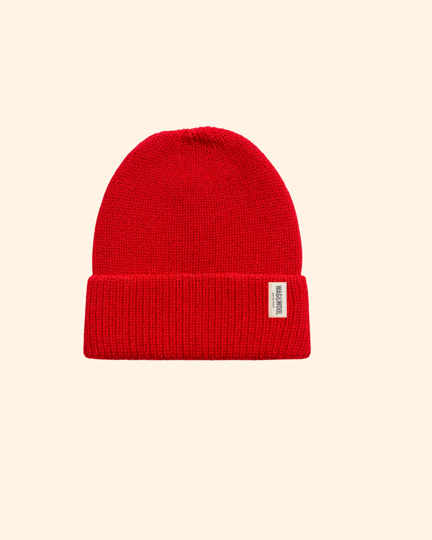 cherry red british wool beanie hat flat lay