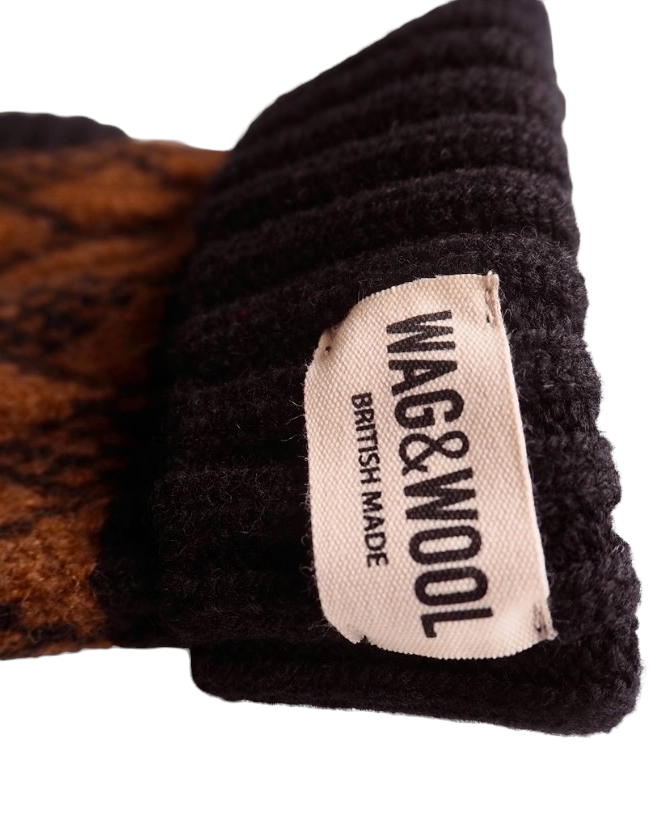 black and brown dog jumper label