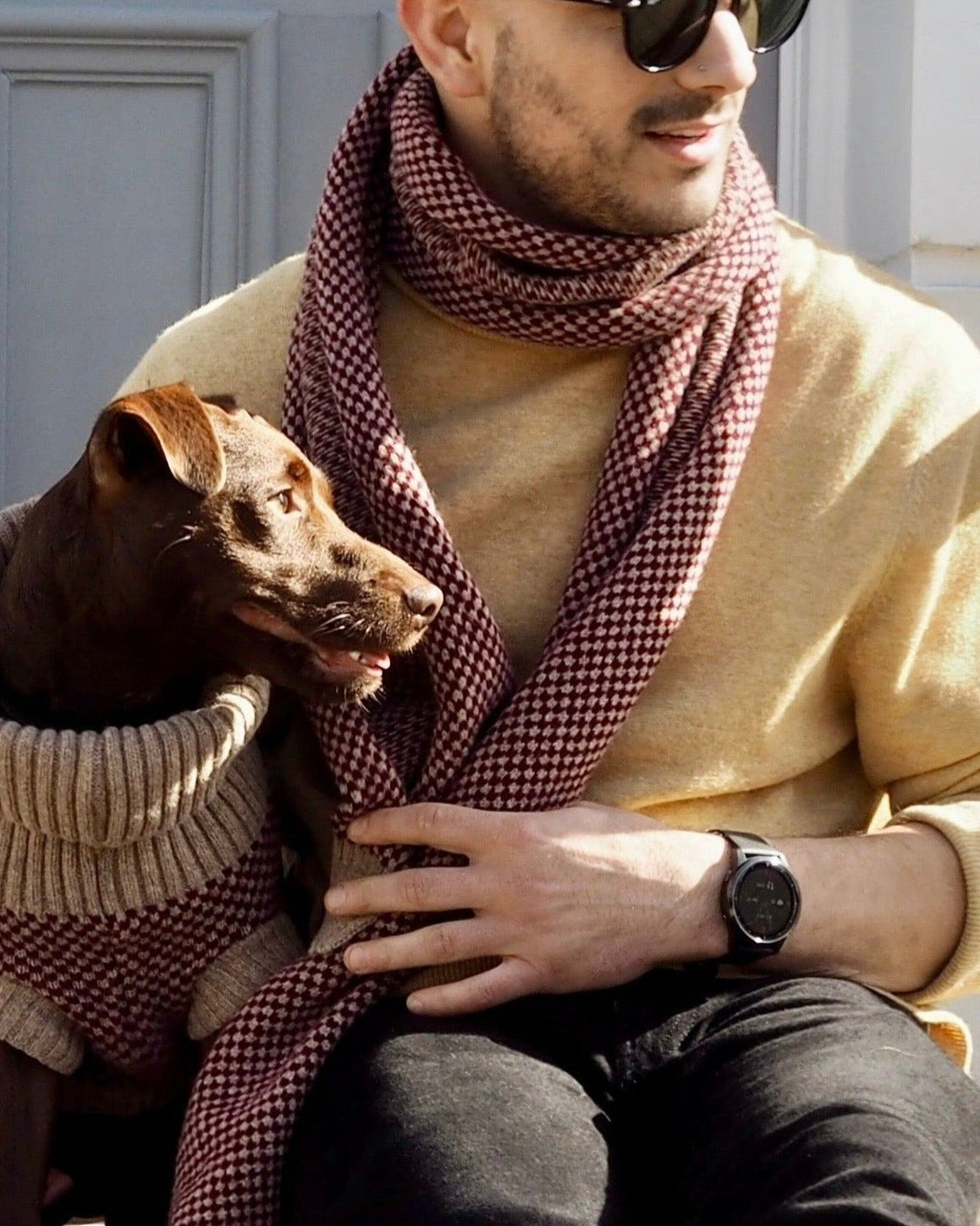 dog and dad in matching outfits