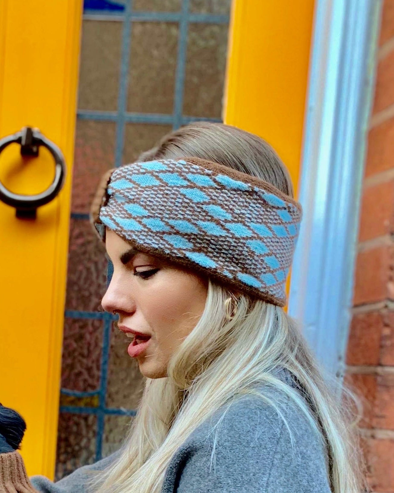 lady in a turquoise and brown headband