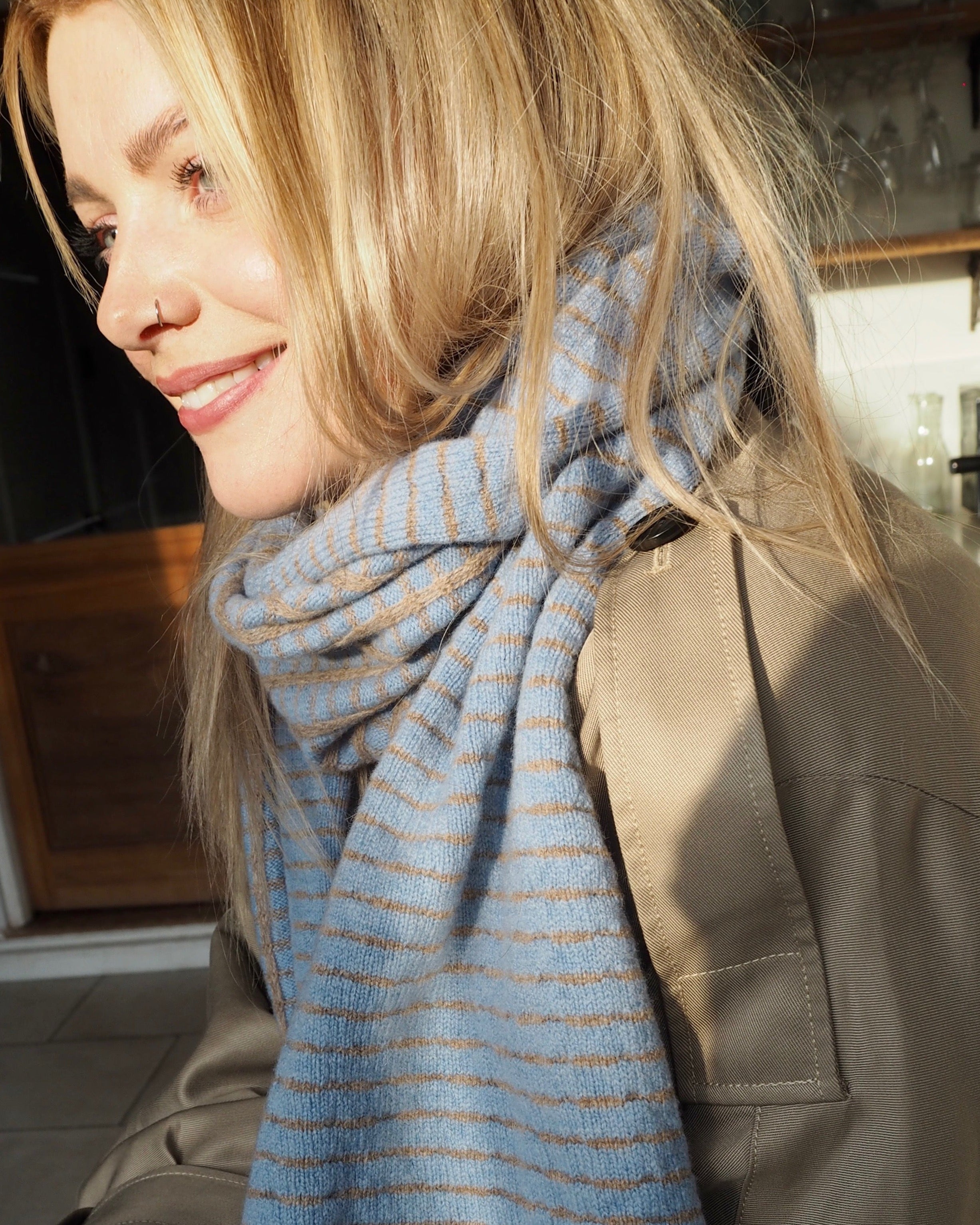 lady in light blue scarf