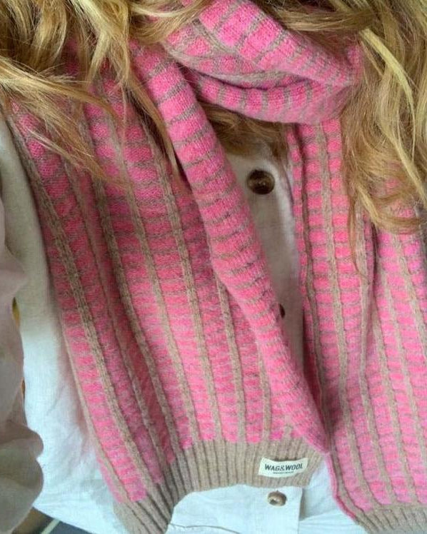 pink wool scarf on a lady