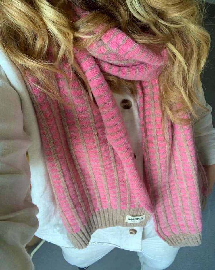 pink wool scarf on a lady 