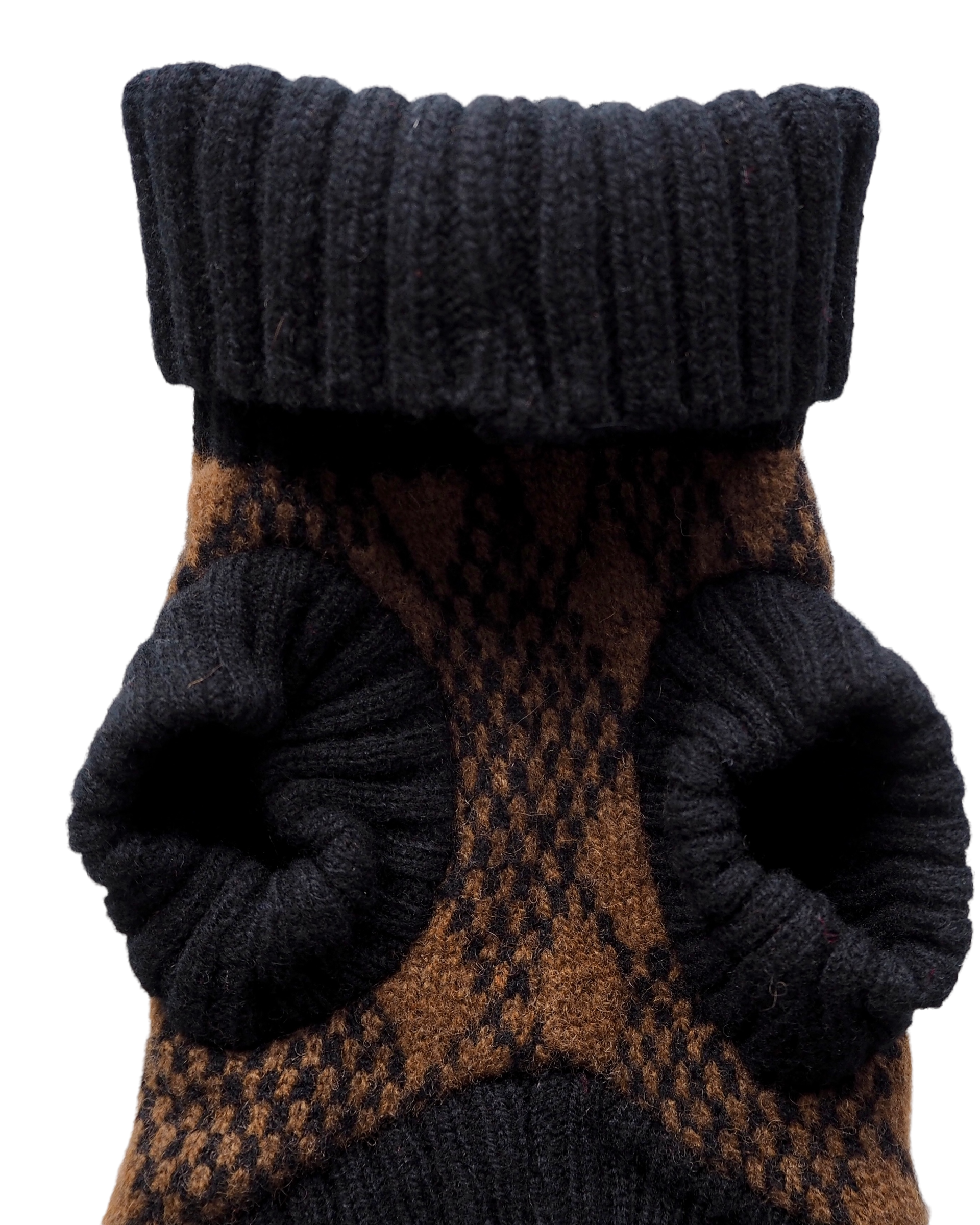 black and brown knitted puppy jumper