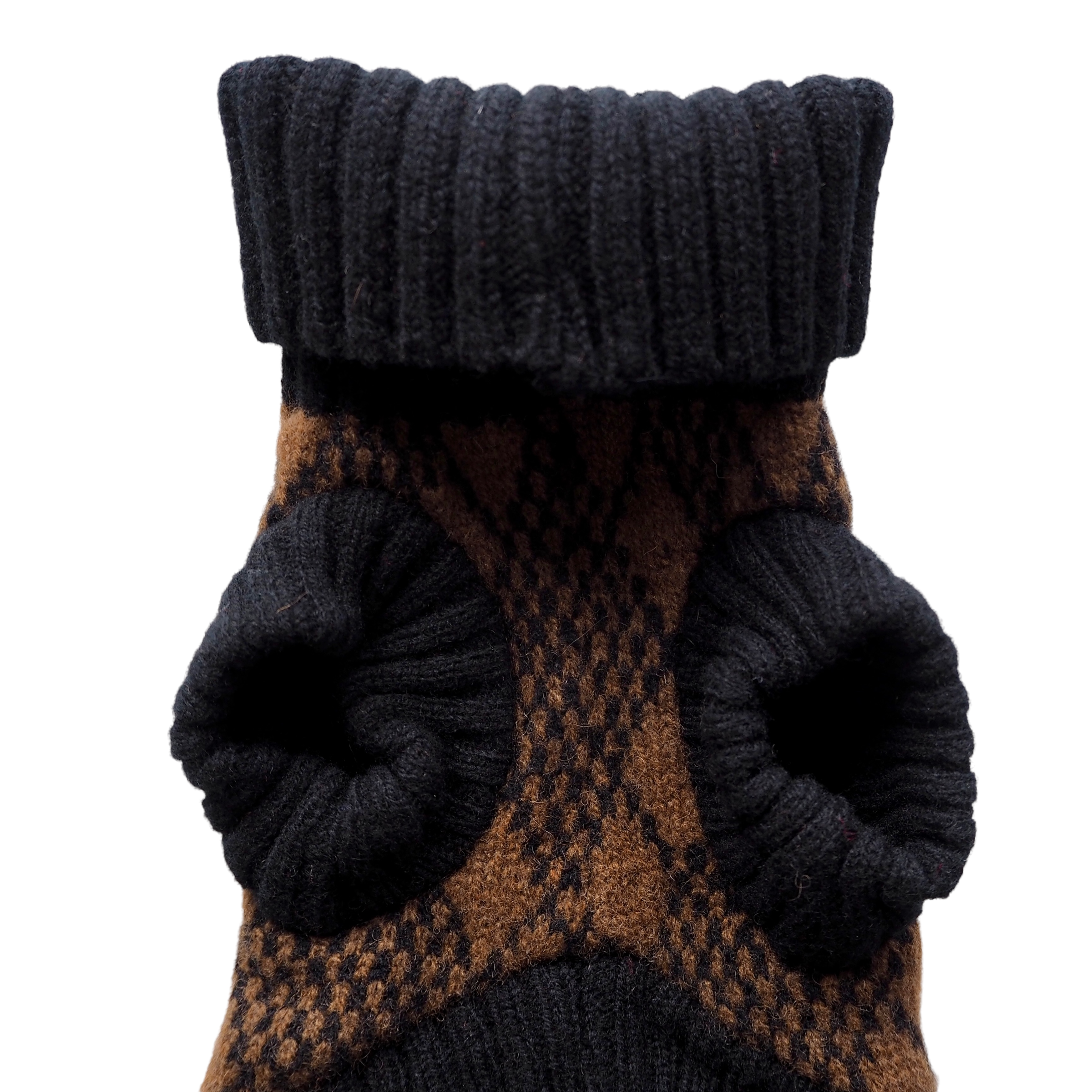 black and brown knitted puppy jumper