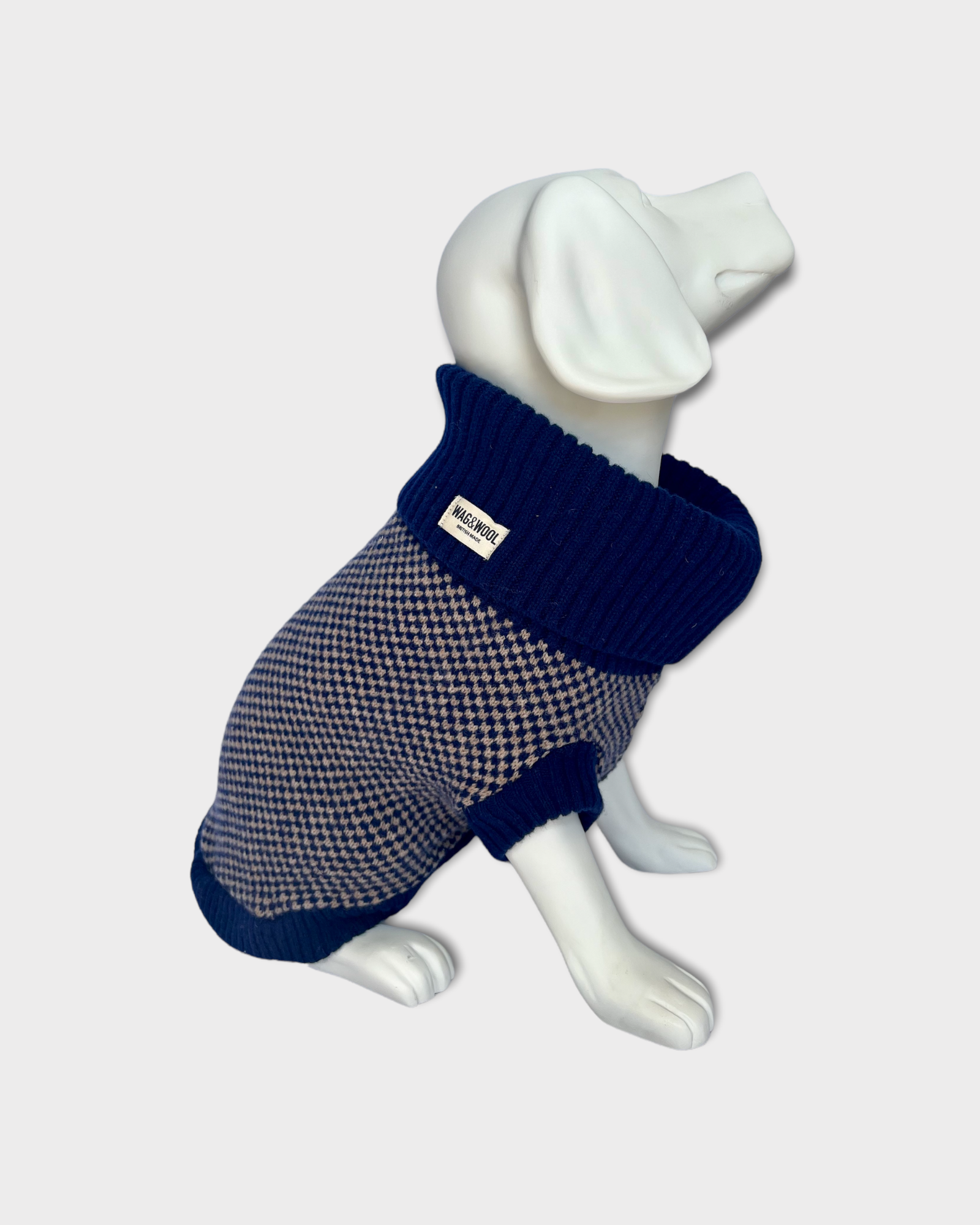 dog mannequin in a navy jumper