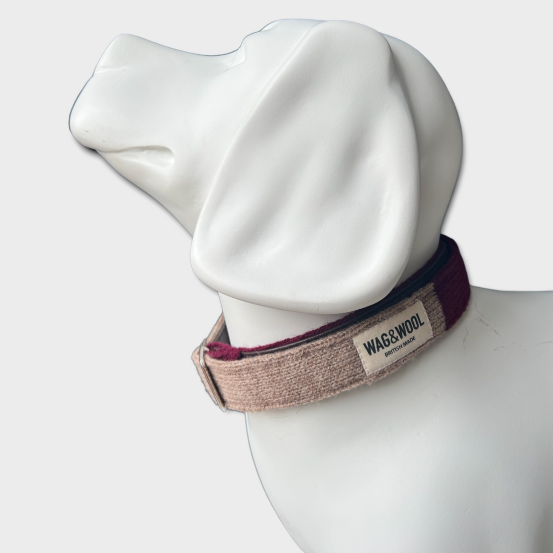 burgundy collar on a dog mannequin