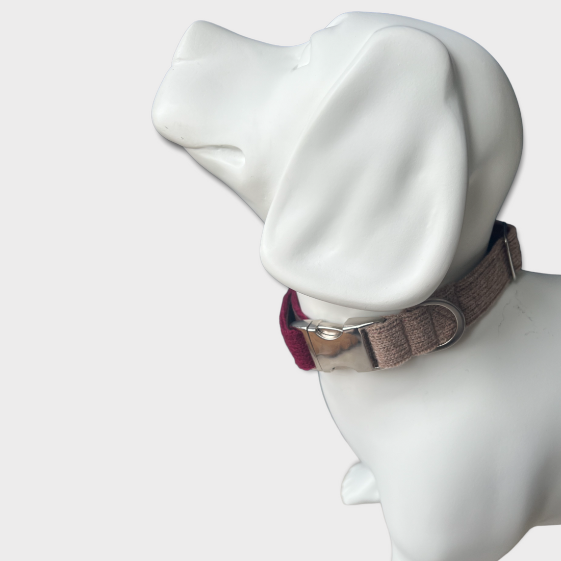 mannequin in a burgundy dog collar 