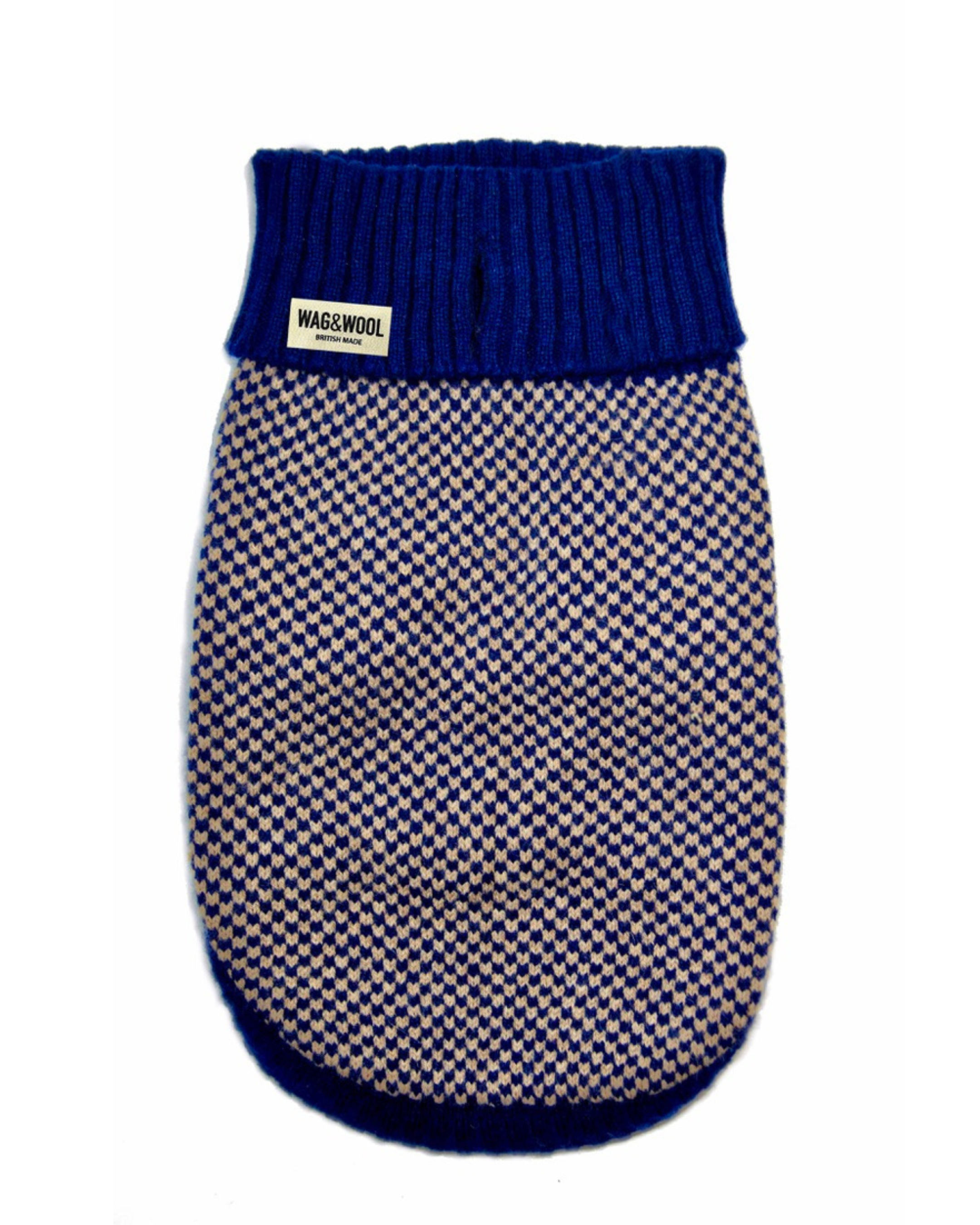 navy puppy jumper flat lay