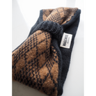 black and brown argyle headband product flat lay