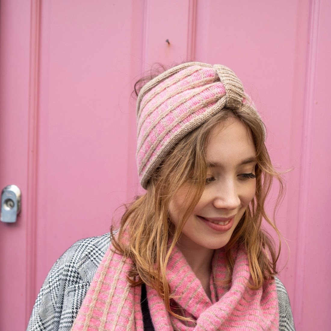 lady in pink knitted headband 