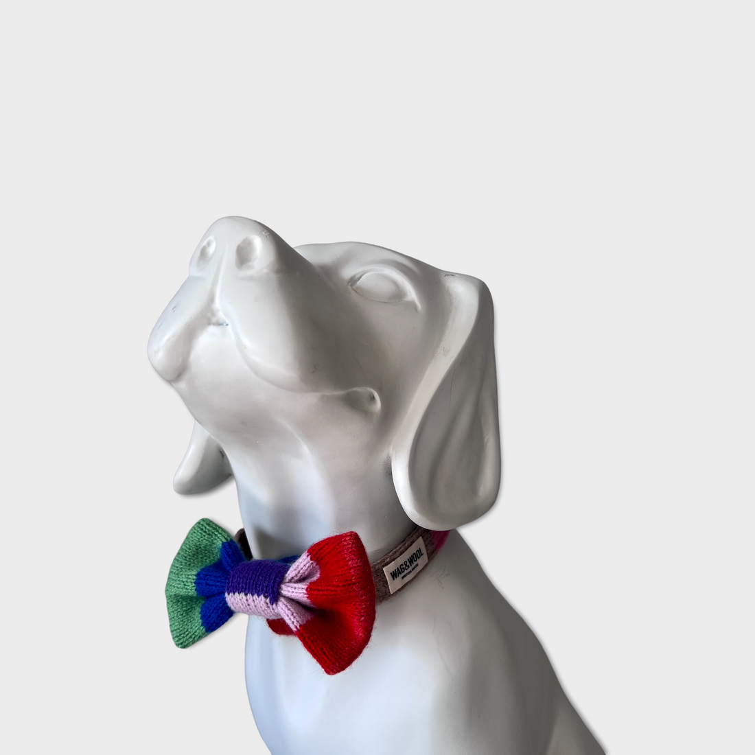 Rainbow dog bow tie on a mannequin