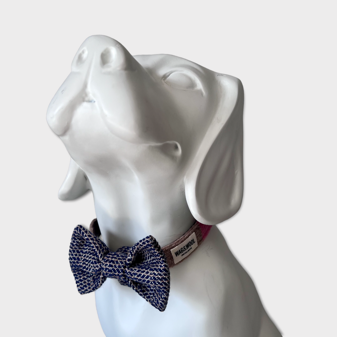 Navy Textured Woven Dog Bow Tie on a mannequin