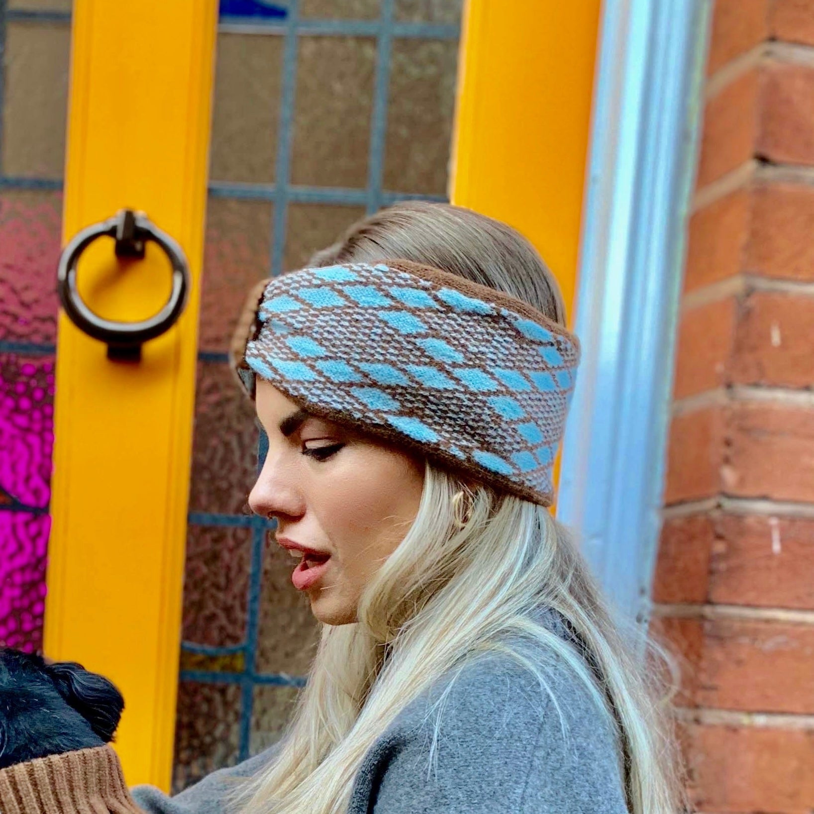 lady in a turquoise and brown headband 