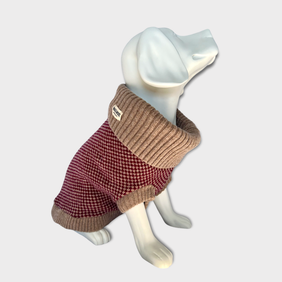 dog mannequin in a burgundy jumper