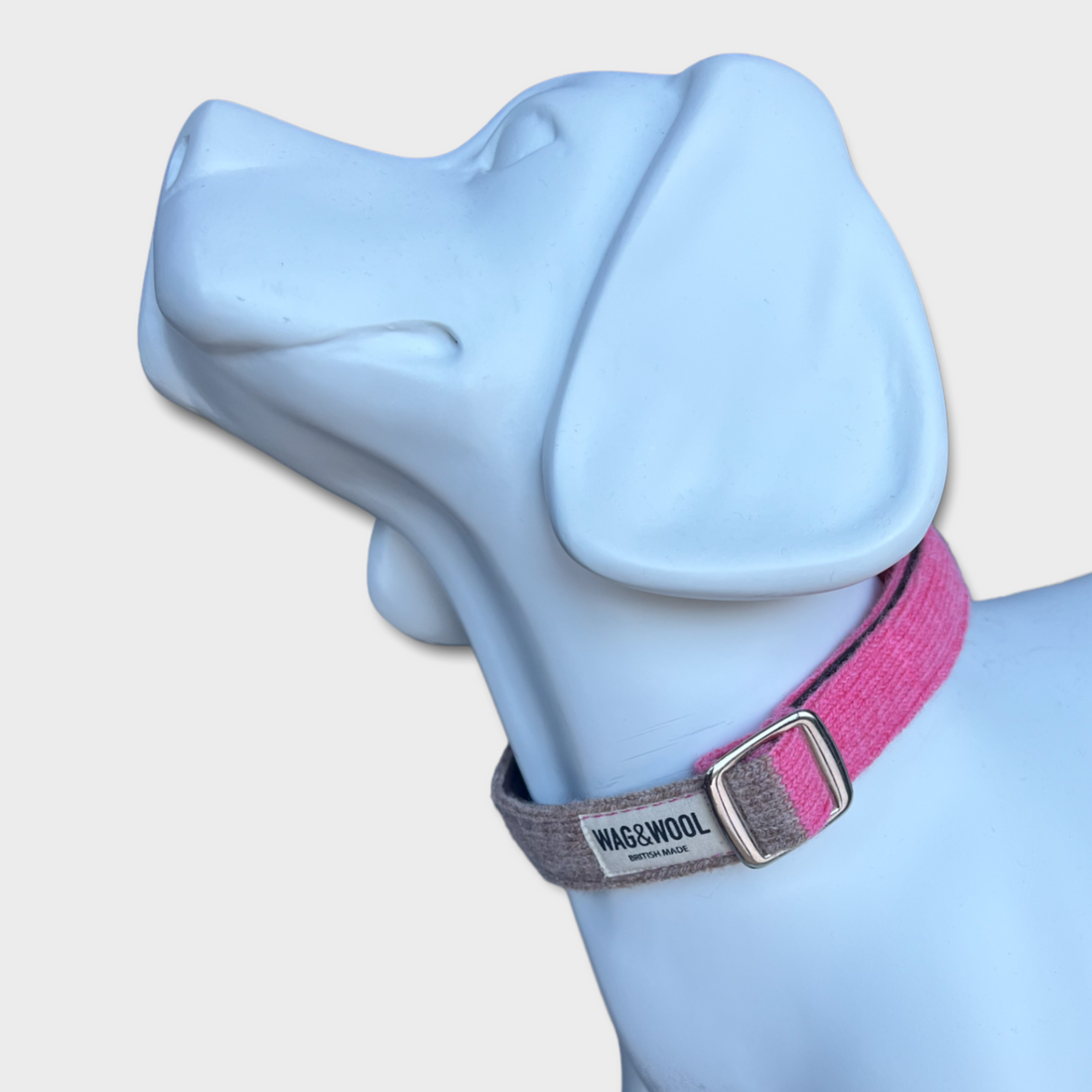 pink dog collar on a mannequin
