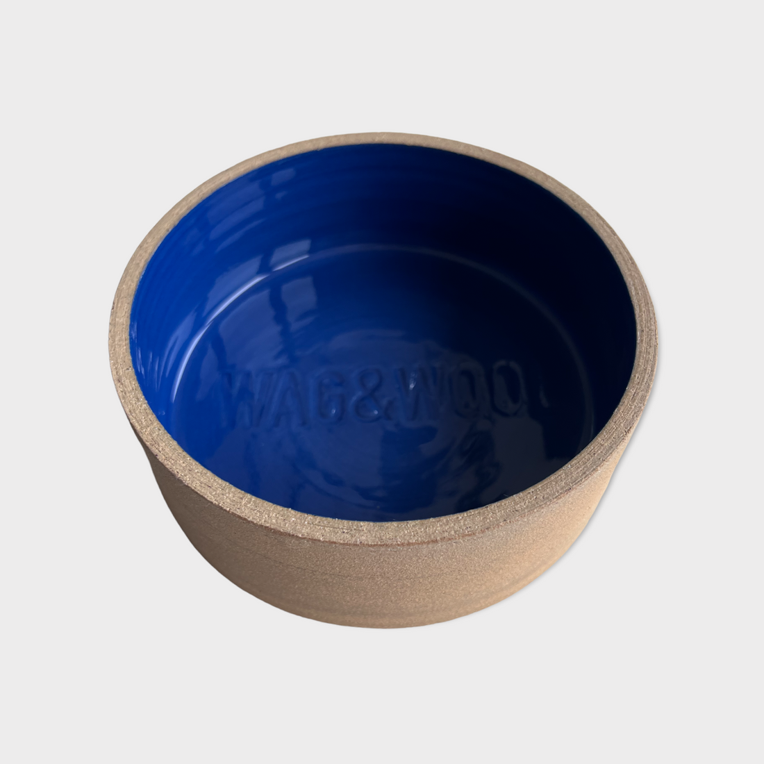 Blue ceramic dog bowl